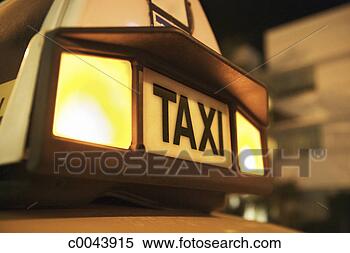 Stock Image - illuminated taxi 
sign. fotosearch 
- search stock 
photos, pictures, 
images, and photo 
clipart
