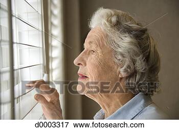 Picture - woman looking 
out window. fotosearch 
- search stock 
photos, pictures, 
images, and photo 
clipart
