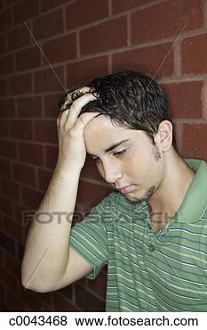 Stock Photo - worried teenage 
boy. fotosearch 
- search stock 
photos, pictures, 
images, and photo 
clipart