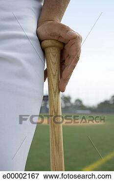 Picture - baseball player 
with baseball 
bat. fotosearch 
- search stock 
photos, pictures, 
images, and photo 
clipart