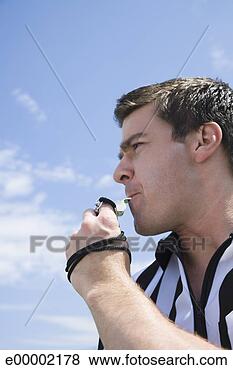 Stock Photo - referee blowing 
whistle. fotosearch 
- search stock 
photos, pictures, 
images, and photo 
clipart