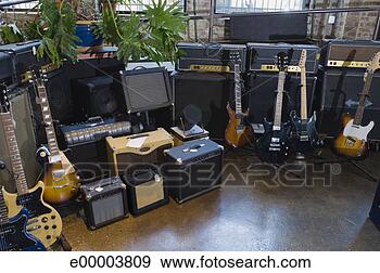 Stock Photograph - guitars in music 
store. fotosearch 
- search stock 
photos, pictures, 
images, and photo 
clipart