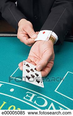 Stock Image - hand pulling ace 
from sleeve. fotosearch 
- search stock 
photos, pictures, 
images, and photo 
clipart
