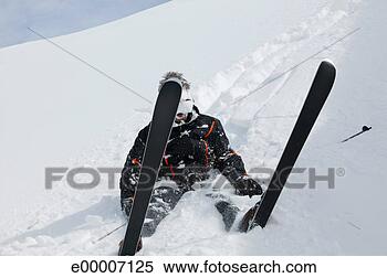 Stock Image - fallen snow skier. 
fotosearch - search 
stock photos, 
pictures, images, 
and photo clipart