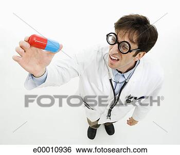 Stock Photo - doctor with pill 
capsule. fotosearch 
- search stock 
photos, pictures, 
images, and photo 
clipart