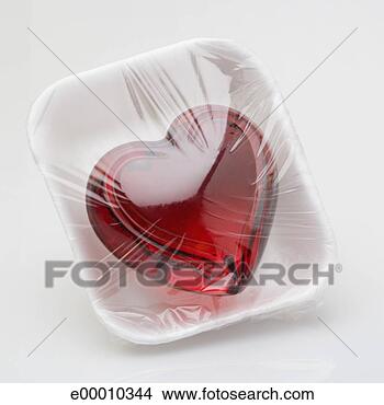 Stock Photo - heart wrapped 
with cellophane. 
fotosearch - search 
stock photos, 
pictures, images, 
and photo clipart