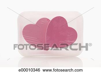 Stock Photo - hearts wrapped 
with cellophane. 
fotosearch - search 
stock photos, 
pictures, images, 
and photo clipart