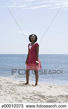 Stock Photo - woman at beach. 
fotosearch - search 
stock photos, 
pictures, images, 
and photo clipart