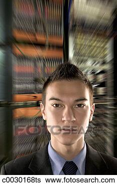 Stock Photo - close-up portrait 
of a serious young 
businessman composited 
with zoom. fotosearch 
- search stock 
photos, pictures, 
images, and photo 
clipart