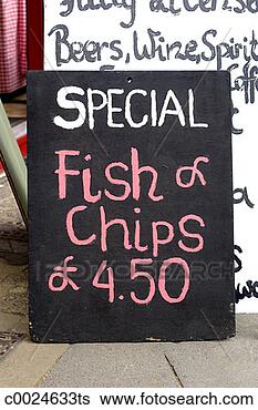 Stock Photo - a sign advertising 
fish & chips for 
£450 on a sidewalk 
in london. fotosearch 
- search stock 
photos, pictures, 
images, and photo 
clipart