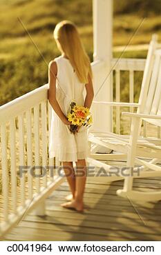 Stock Photo - girl on porch. 
fotosearch - search 
stock photos, 
pictures, images, 
and photo clipart