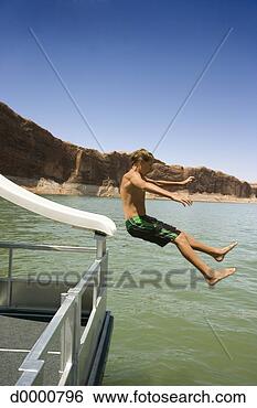 Stock Photo - teenage boy falling 
from slide into 
lake. fotosearch 
- search stock 
photos, pictures, 
images, and photo 
clipart