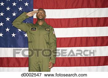 Picture - us air force pilot 
saluting and american 
flag. fotosearch 
- search stock 
photos, pictures, 
images, and photo 
clipart