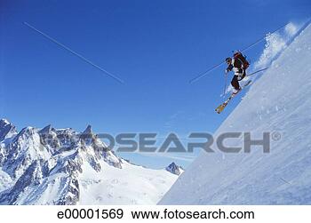 Stock Photograph - person skiing 
down a mountain. 
fotosearch - search 
stock photos, 
pictures, images, 
and photo clipart
