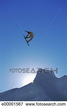 Picture - skier in a mid-air 
jump. fotosearch 
- search stock 
photos, pictures, 
images, and photo 
clipart