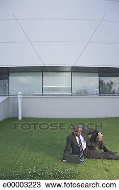 Stock Photo - businessman using 
laptop computer. 
fotosearch - search 
stock photos, 
pictures, images, 
and photo clipart