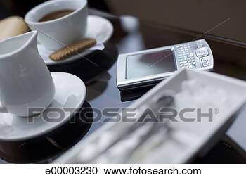 Arquivo de Fotografias - pda,  café,  tabela. 
fotosearch - busca 
de fotos, imagens 
e clipart