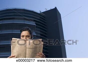 Picture - woman reading 
newspaper. fotosearch 
- search stock 
photos, pictures, 
images, and photo 
clipart