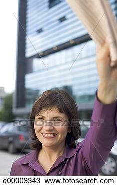 Stock Photo - smiling woman 
waving. fotosearch 
- search stock 
photos, pictures, 
images, and photo 
clipart