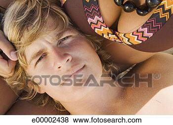 Stock Photo - man resting his 
head on woman's 
lap. fotosearch 
- search stock 
photos, pictures, 
images, and photo 
clipart