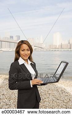 Picture - woman with laptop. 
fotosearch - search 
stock photos, 
pictures, images, 
and photo clipart