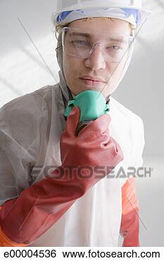 Stock Photo - worker in hazmat 
suit. fotosearch 
- search stock 
photos, pictures, 
images, and photo 
clipart