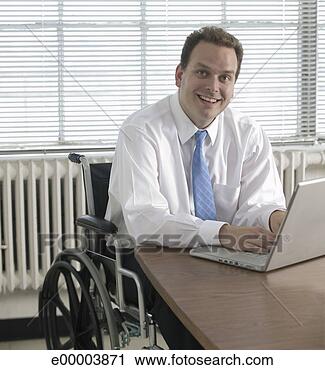 Stock Photography - man in wheelchair 
with laptop. fotosearch 
- search stock 
photos, pictures, 
images, and photo 
clipart