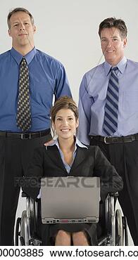 Stock Image - woman in wheelchair 
with laptop and 
businessmen. fotosearch 
- search stock 
photos, pictures, 
images, and photo 
clipart