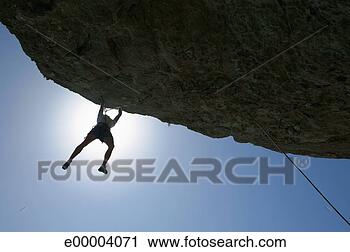 Arquivo de Fotografia - homem,  rocha, 
 escalando. fotosearch 
- busca de fotos, 
imagens e clipart