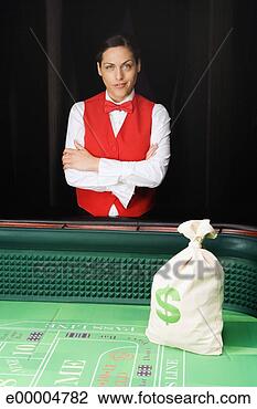 Stock Photo - casino dealer 
with bag of cash. 
fotosearch - search 
stock photos, 
pictures, images, 
and photo clipart