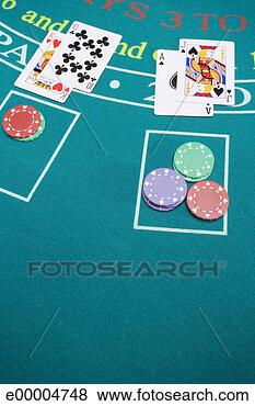 Stock Photo - chips and playing 
cards on gambling 
table. fotosearch 
- search stock 
photos, pictures, 
images, and photo 
clipart