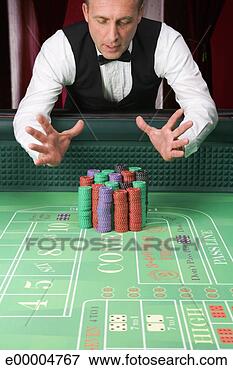 Picture - dealer with chips 
on gambling table. 
fotosearch - search 
stock photos, 
pictures, images, 
and photo clipart