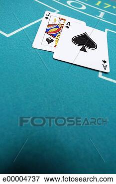Picture - playing cards 
on poker table. 
fotosearch - search 
stock photos, 
pictures, images, 
and photo clipart