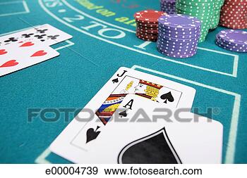 Stock Photograph - playing cards 
on poker table. 
fotosearch - search 
stock photos, 
pictures, images, 
and photo clipart
