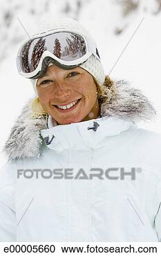 Stock Photography - smiling woman 
in ski gear. fotosearch 
- search stock 
photos, pictures, 
images, and photo 
clipart