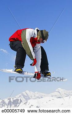 Stock Photograph - snowboarder in 
mid-air. fotosearch 
- search stock 
photos, pictures, 
images, and photo 
clipart