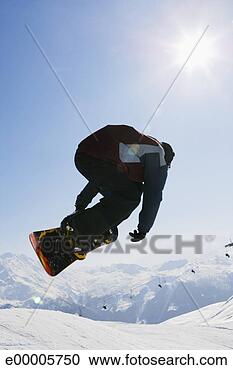 Stock Photography - snowboarder in 
mid-air. fotosearch 
- search stock 
photos, pictures, 
images, and photo 
clipart
