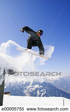 Stock Image - snowboarder in 
mid-air. fotosearch 
- search stock 
photos, pictures, 
images, and photo 
clipart