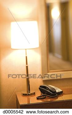 Stock Photo - lamp and telephone 
in hotel room. 
fotosearch - search 
stock photos, 
pictures, images, 
and photo clipart