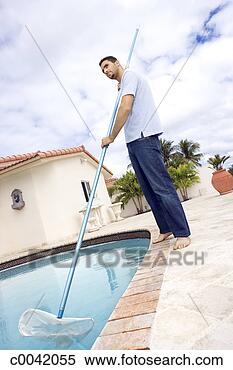 Stock Image - man cleaning pool. 
fotosearch - search 
stock photos, 
pictures, images, 
and photo clipart