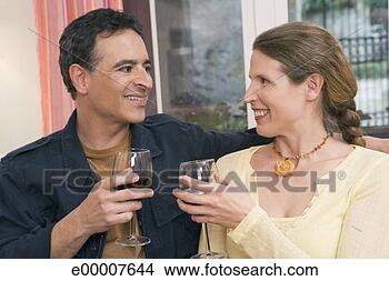 Stock Photo - couple toasting 
with red wine. 
fotosearch - search 
stock photos, 
pictures, images, 
and photo clipart