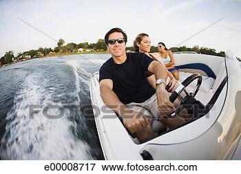 Picture - friends riding 
speedboat. fotosearch 
- search stock 
photos, pictures, 
images, and photo 
clipart
