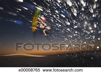 Stock Image - midair wakeboarder 
at sunset. fotosearch 
- search stock 
photos, pictures, 
images, and photo 
clipart