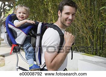 Stock Photo - father carrying 
son in backpack. 
fotosearch - search 
stock photos, 
pictures, images, 
and photo clipart