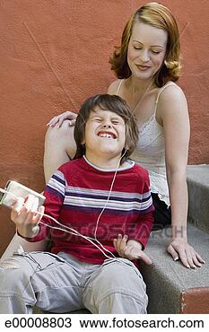 Stock Photo - mother and son 
playing air guitar. 
fotosearch - search 
stock photos, 
pictures, images, 
and photo clipart