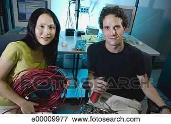 Picture - tech support coworkers. 
fotosearch - search 
stock photos, 
pictures, images, 
and photo clipart