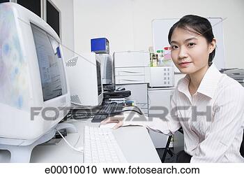 Stock Photography - woman using computer. 
fotosearch - search 
stock photos, 
pictures, images, 
and photo clipart