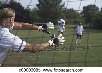 Stock Image - goalie blocking 
soccer ball. fotosearch 
- search stock 
photos, pictures, 
images, and photo 
clipart