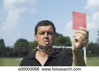 Stock Photo - referee holding 
red card. fotosearch 
- search stock 
photos, pictures, 
images, and photo 
clipart