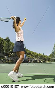 Picture - tennis player 
serving ball. 
fotosearch - search 
stock photos, 
pictures, images, 
and photo clipart